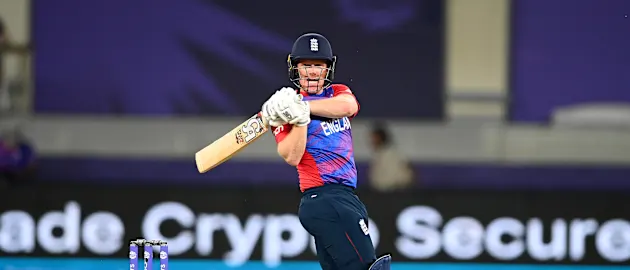 Eoin Morgan of England hits runs during the ICC Men's T20 World Cup match between England and West Indies at Dubai International Stadium on October 23, 2021 in Dubai, United Arab Emirates.