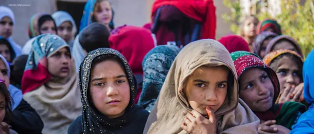 Zainab (right), 10, and her sister Madina, 8, at the child-friendly space in Ettifaq, Nangarhar. Displaced by conflict, it’s the first time they have an opportunity to study and play with other girls.