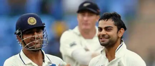 37346 MS Dhoni and Virat Kohli celebrate the win