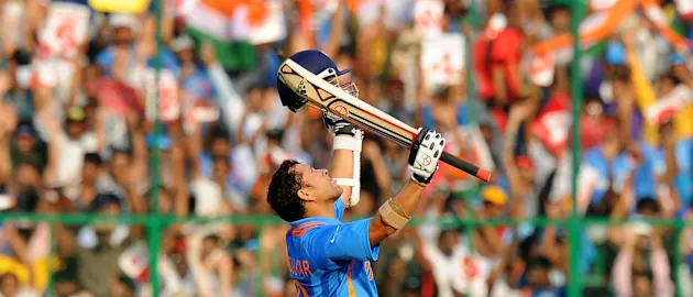 Sachin Tendulkar celebrates his century against England.