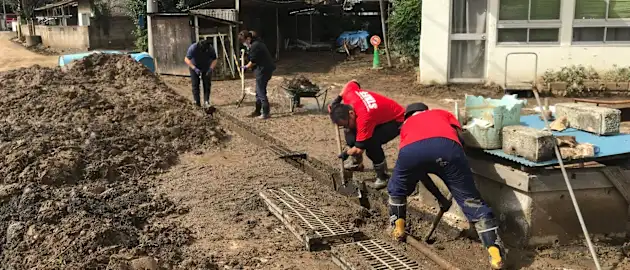 All members of the association staff gave three afternoons a week for two months after the typhoon to volunteer