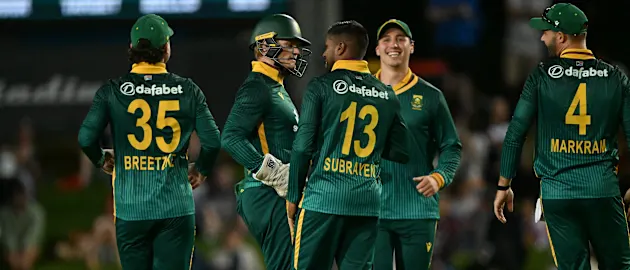 South Africa's bowler Prenelan Subrayen (C) celebrates his wicket of Australia's Travis Head with teammates during the first one-day international (ODI) cricket match between Australia and South Africa