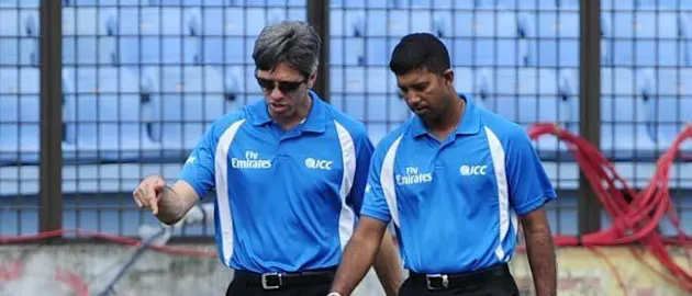 51660 Match umpires Kumar Dharmasena (R) and N