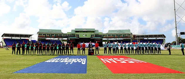 The teams line up ahead of the ICC U19 Men's Cricket World Cup match between Bangladesh and England at Warner Park Sporting Complex on January 16, 2022 in Basseterre, Saint Kitts and Nevis.