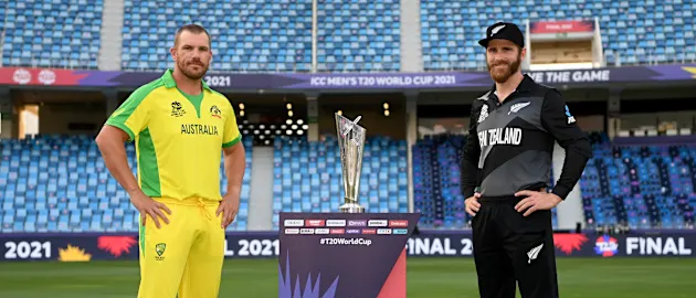 Rival captains Aaron Finch of Australia and Kane Williamson of New Zealand pose with the T20 World Cup Trophy
