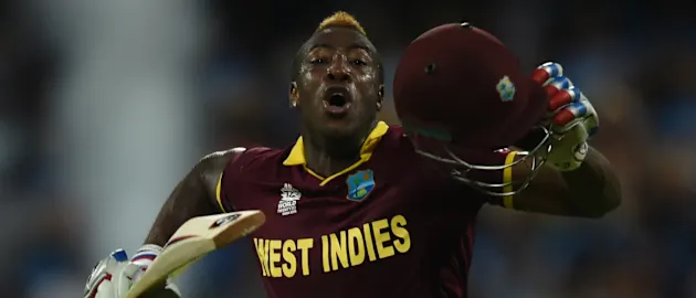 Andre Russell celebrates after scoring the winning runs