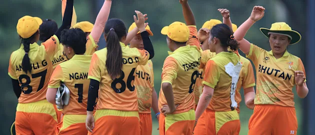 Bhutan players celebrate a wicket during their win over Qatar