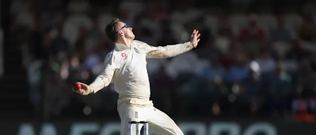 Dom Bess loads up as he prepares to deliver the ball