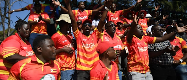 Fans of Zimbabwe react in the crowd during the ICC Men's Cricket World Cup Qualifier Zimbabwe 2023 match between Zimbabwe and the Netherlands at Harare Sports Club on June 20, 2023 in Harare, Zimbabwe.