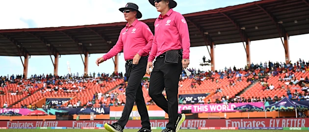 Umpires Chris Gaffaney (R) and Rod Tucker walk out on to the field during the ICC Men's T20 Cricket World Cup West Indies & USA 2024 Semi-Final match between India and England at Providence Stadium on June 27, 2024 in Georgetown, Guyana.