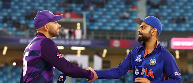 Kyle Coetzer of Scotland and Virat Kohli of India shake hands during the ICC Men's T20 World Cup match between India and Scotland at Dubai International Cricket Ground on November 05, 2021 in Dubai, United Arab Emirates.