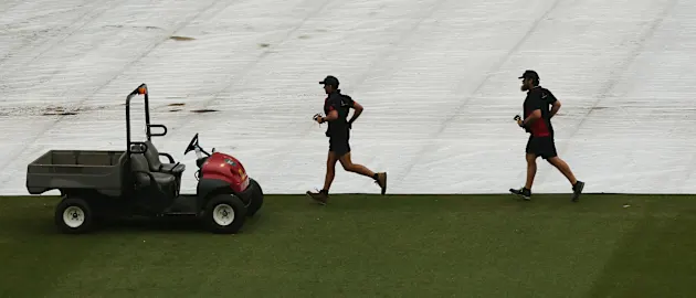 The umpires called off play after persistent rain with Australia 103 for 2 and trailing the tourists by 61 runs.