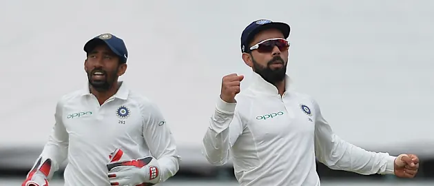Wriddihiman Saha and Virat Kohli