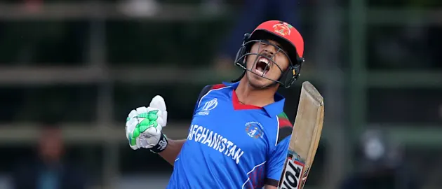 Sharafuddin Ashraf exults after the winning runs were scored