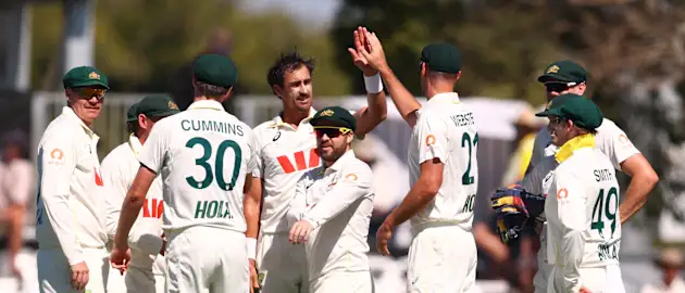 Mitchell Starc of Australia celebrates after taking the wicket of Litton Das of Bangladesh during day two of the Second Test Match