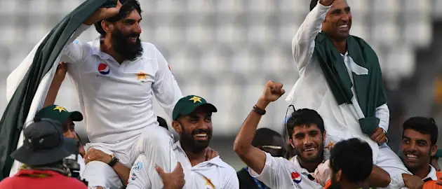 Misbah- ul- Haq and Younis Khan are carried by their teammates after winning the Third Test against West indies.