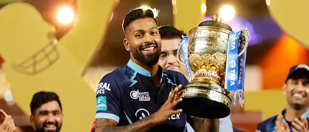 hardik with trophy