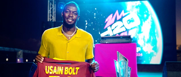 Usain Bolt with the ICC Men's T20 World Cup trophy