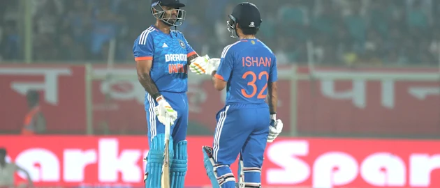 India's Ishan Kishan and India's captain Suryakumar Yadav interact during game one of the T20 International Series
