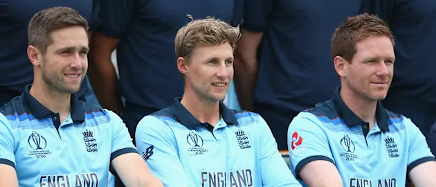 Chris Woakes, Joe Root and Eoin Morgan of England pose during a team photograph prior to an England Nets session at Lord's on June 24, 2019 in London, England.