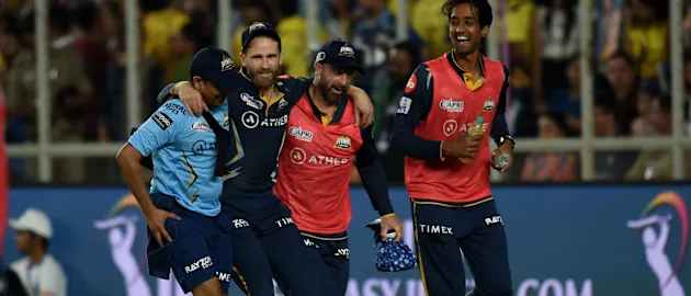 Williamson is helped from the field after injuring his knee in the IPL when playing for Gujarat Titans // Getty Images
