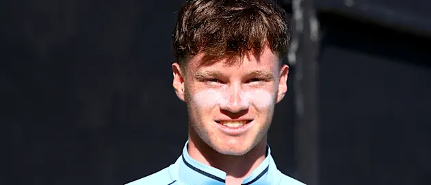 Tom Prest of England poses after being named Player of the Match following the ICC U19 Men's Cricket World Cup match between England and United Arab Emirates at Warner Park Sporting Complex on January 20, 2022 in Basseterre, Saint Kitts and Nevis.