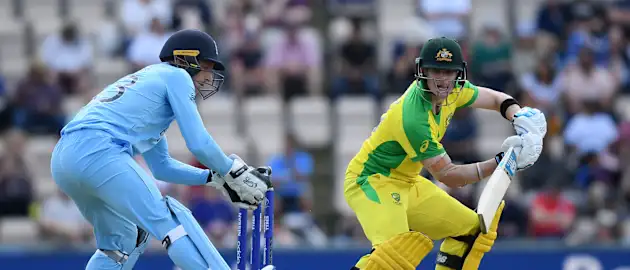 Steve Smith of Australia plays a shot as England wicketkeeper Jos Buttler looks on during the ICC Cricket World Cup 2019 Warm Up match between England and Australia at Ageas Bowl on May 25, 2019 in Southampton, England.