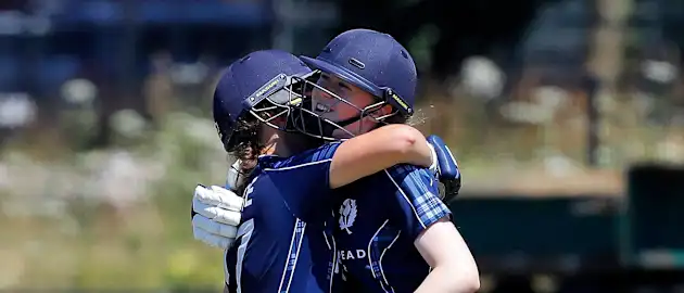 K Bryce hugs her sister S Bryce after scoring 50 runs, 3rd Place Play-off, ICC Women's World Twenty20 Qualifier at Utrecht, Jul 14th 2018.
