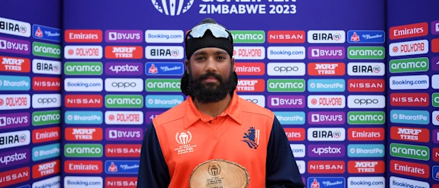 Vikram Singh of Netherlands poses after being named Player of the Match following the ICC Men's Cricket World Cup Qualifier Zimbabwe 2023 Super 6 match between Netherlands and Oman at Harare Sports Club on July 03, 2023 in Harare, Zimbabwe.