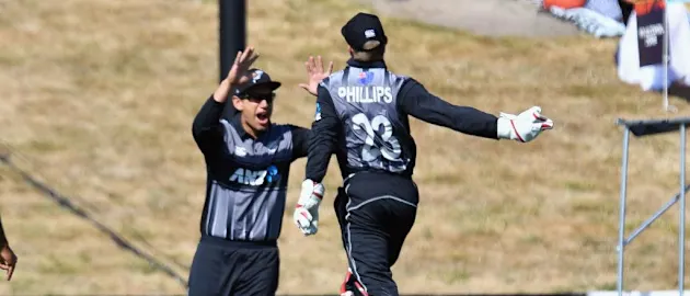 Glenn Phillips leads the celebrations after a New Zealand wicket