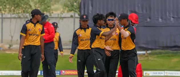 Malaysia celebrate a wicket at the ICC Under-19 Men’s Cricket World Cup Asia Qualifier 2023 in UAE.
