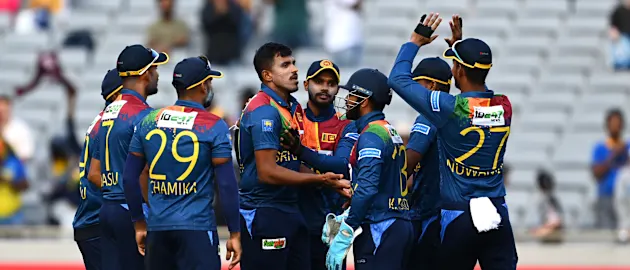 Maheesh Theekshana of Sri Lanka celebrates the wicket of Jimmy Neesham of the Black Caps in the super over during game one in the T20 International series between New Zealand and Sri Lanka at Eden Park on April 02, 2023 in Auckland, New Zealand.
