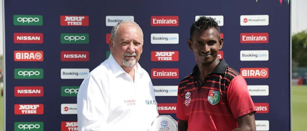 Selladore Kumar gets the Player of the Match award against Scotland.