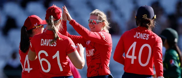 England's Charlie Dean celebrates with teammates after the dismissal of Pakistan's Muneeba Ali during the Group B T20 women's World Cup cricket match between England and Pakistan 1920x1080