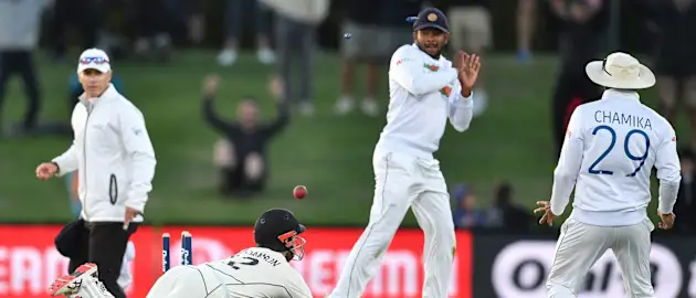 A desperate Kane Williamson just manages to make his ground off the final ball of the match