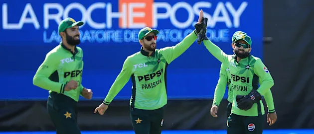 Pakistan's Salman Ali Agha and teammate wicketkeeper Mohammad Rizwan during the 1st ODI cricket match between New Zealand and Pakistan