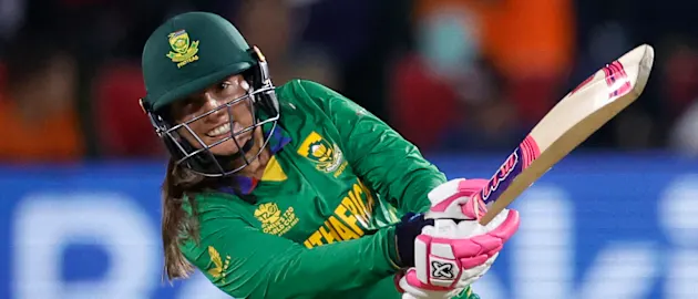 South Africa's Sune Luus watches the ball after playing a shot during the Group A T20 women's World Cup cricket match between South Africa and Australia at St George's Park in Gqeberha on February 18, 2023.