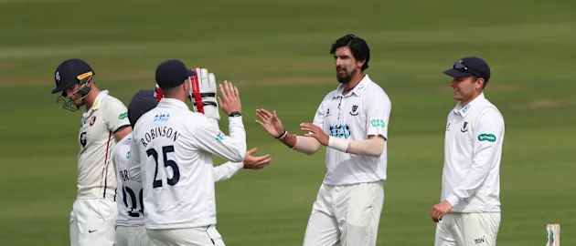 Ishant Sharma celebrates a wicket with his Sussex team-mates