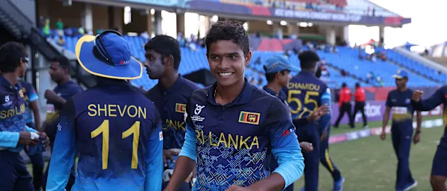 Dunith Wellalage of Sri Lanka celebrates victory during the ICC U19 Men's Cricket World Cup match between South Africa and Sri Lanka at Sir Vivian Richards Stadium on January 30, 2022 in Antigua, Antigua and Barbuda.