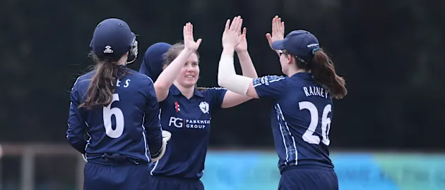 Katherine Fraser of Scotland is congratulated by her teamates during the CWG Qualifier 2022