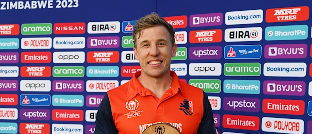 Logan van Beek of Netherlands poses for a photo while holding the Player of the Match award after the teams victory in the Super Over of the ICC World Cup Qualifier Zimbabwe 2023 match between the West Indies and Netherlands on June 26, 2023.