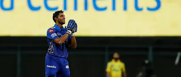 Tilak Varma celebrates after finishing the game off for Mumbai Indians against arch-rivals Chennai Super Kings