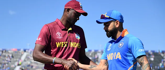 Jason Holder of West Indies and Virat Kohli of India shake hands during the Group Stage match of the ICC Cricket World Cup 2019 between West Indies and India at Old Trafford on June 27, 2019 in Manchester, England.