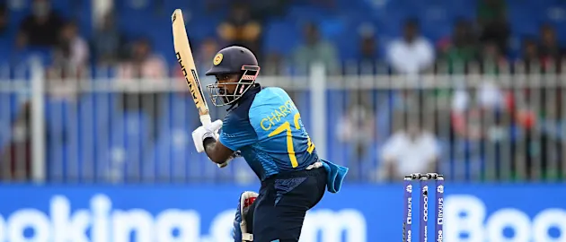 Charith Asalanka of Sri Lanka plays a shot during the ICC Men's T20 World Cup match between Sri Lanka and Bangladesh at Sharjah Cricket Stadium on October 24, 2021 in Sharjah, United Arab Emirates.