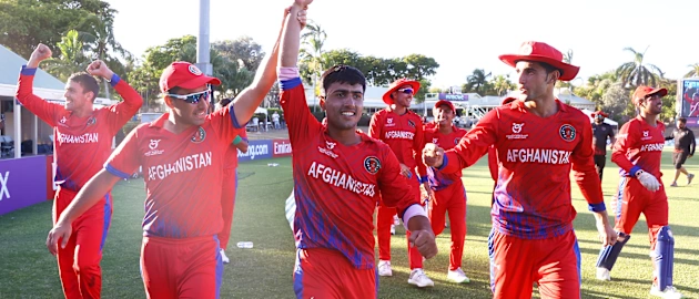 Players of Afghanistan celebrate following their 4 run victory during the ICC U19 Men's Cricket World Cup match between Sri Lanka and Afghanistan at Coolidge Cricket Ground on January 27, 2022 in Antigua, Antigua and Barbuda.