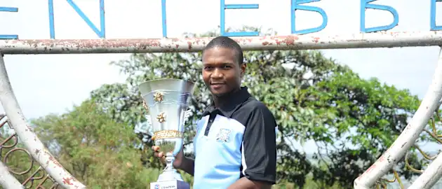 Botswana captain Karabo Mothlanka with the ICC T20 World Cup Africa Final Qualifier trophy