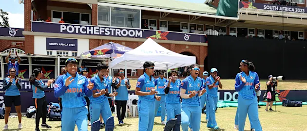 Players of India celebrate on the bench as India defeat New Zealand during the ICC Women's U19 T20 World Cup 2023 Semi Final match between India and New Zealand at JB Marks Oval on January 27, 2023 in Potchefstroom, South Africa.