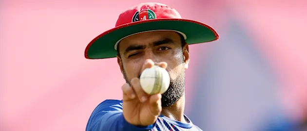 Rashid Khan Arman of Afghanistan bowls in the nets at HPCA Stadium in Dharamsala during a training session on October 06, 2023 in Dharamsala