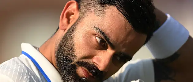 Virat Kohli of India leaves teh field after day four of the ICC World Test Championship Final between Australia and India