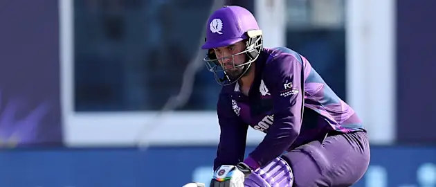Calum MacLeod plays a shot during the ICC mens Twenty20 World Cup cricket match between Scotland and Papua New Guinea at the Oman Cricket Academy Ground in Muscat on October 19, 2021.